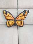 Almofada em forma de borboleta