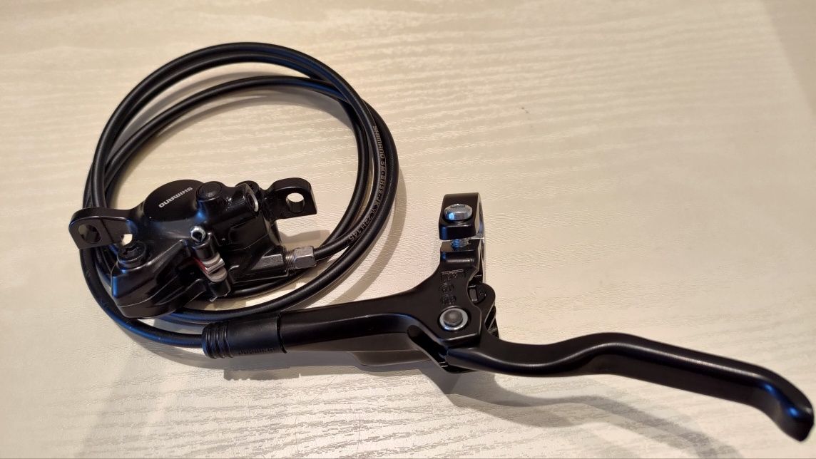 Задний гидравлический тормоз Shimano mt 200
