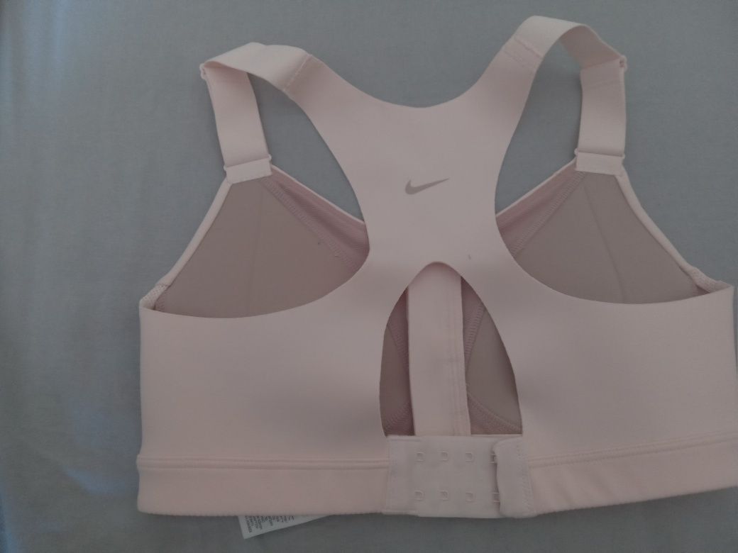 Top esportivo rosa nike.