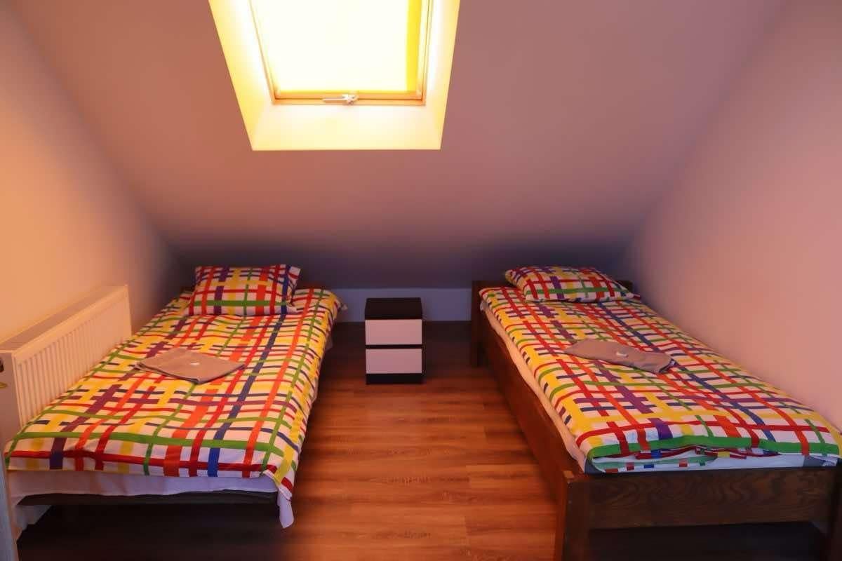 Noclegi Domek pod lasem