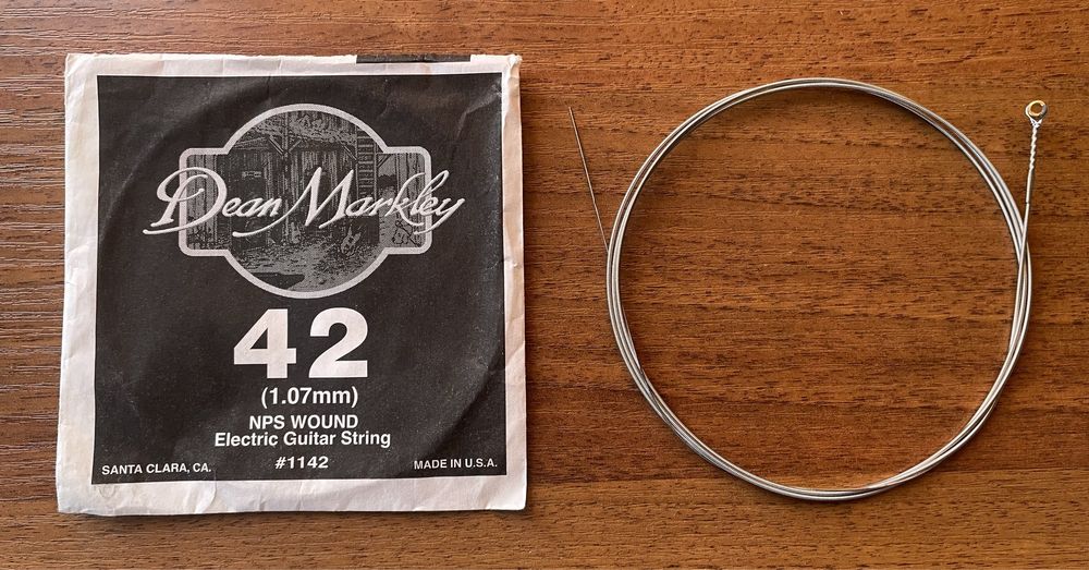 Струни Dean Markley 42 (5-а) та 52 (6-а) до електрогітари
