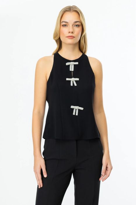 Жилет з бантіками