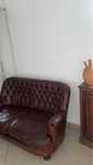sofá Chesterfield em couro genuino