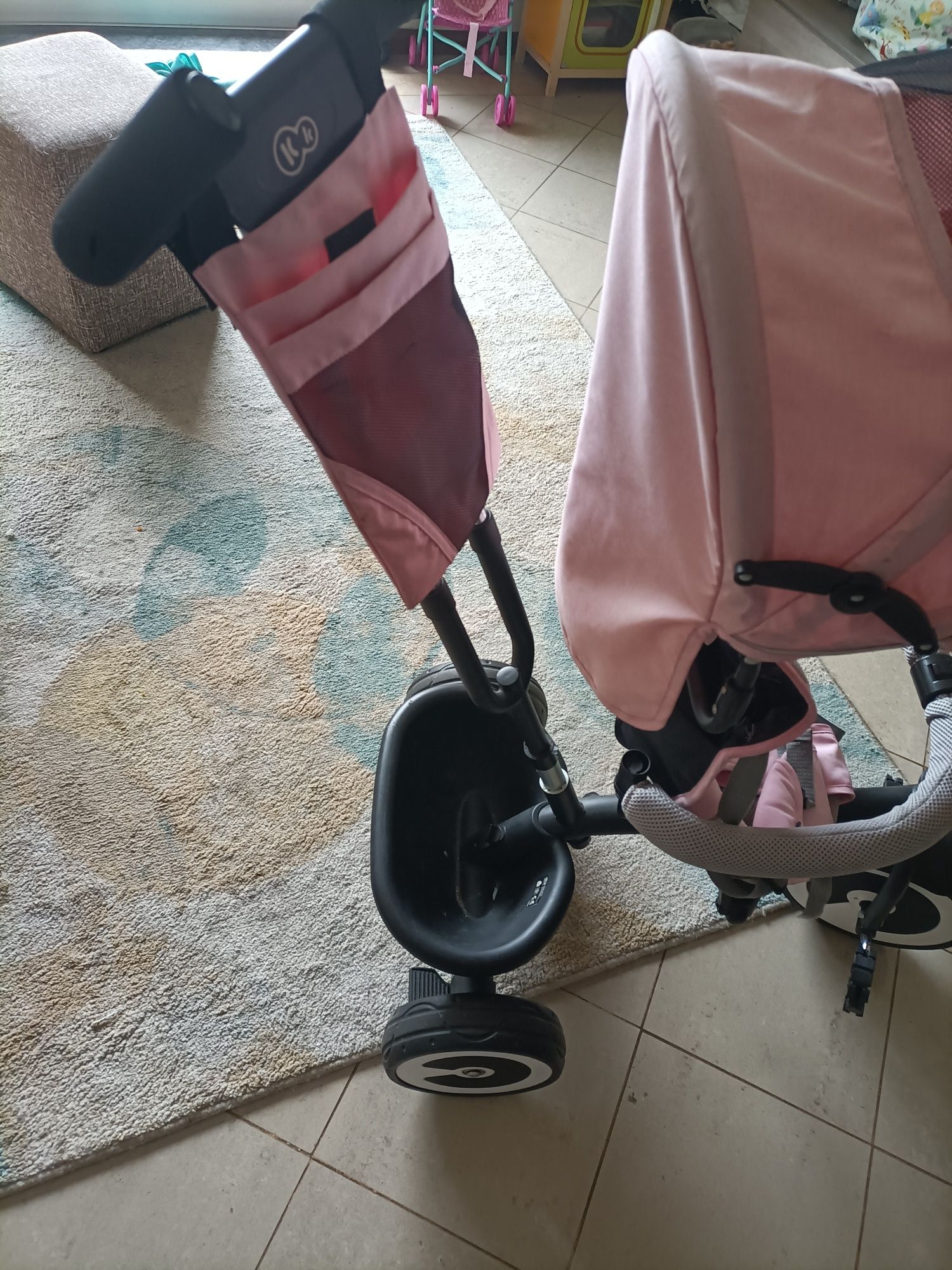 Triciclo rosa usado
