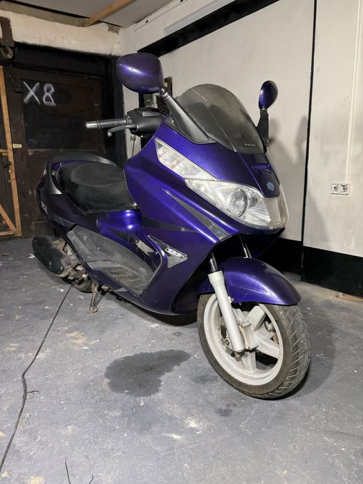 \ Piaggio X8 125 /
