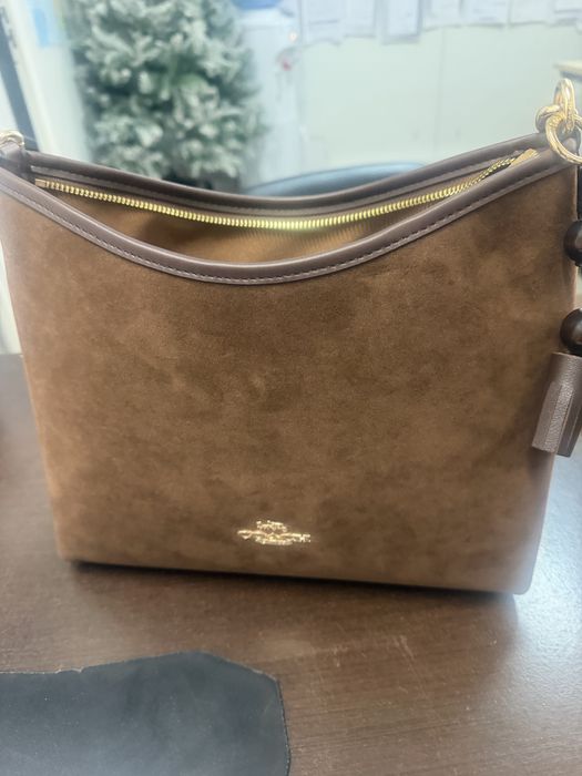 Mala coach nova logotipada