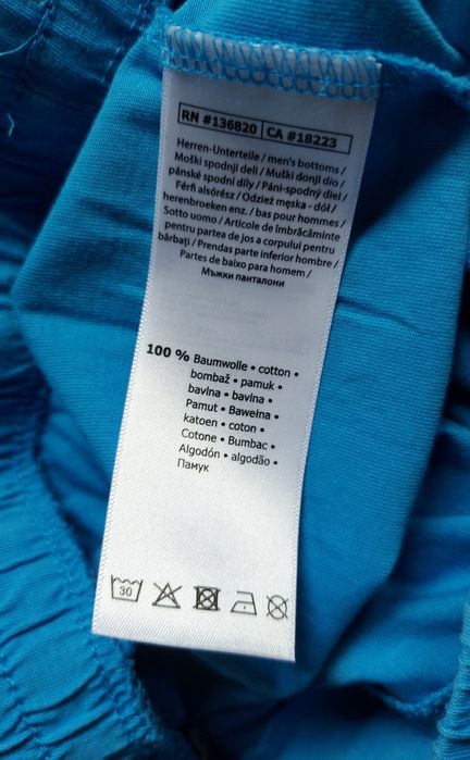 Błękitne spodenki męskie Kappa