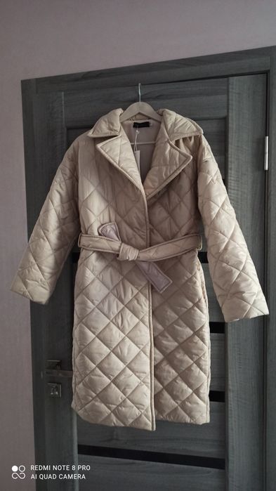 Жіноче стьобане пальто курточка з поясом