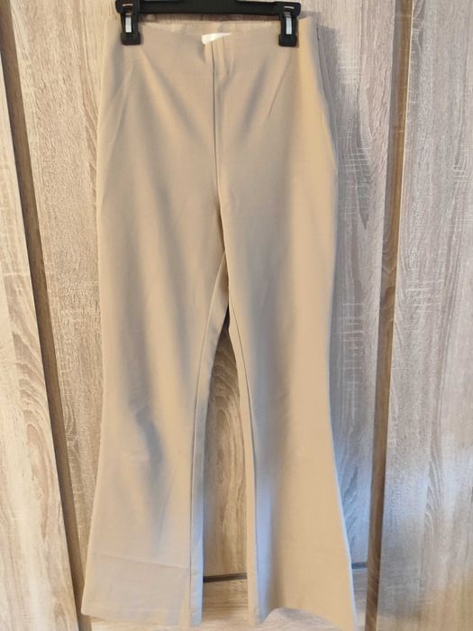 Eleganckie spodnie dzwony rozm. 36 z H&M