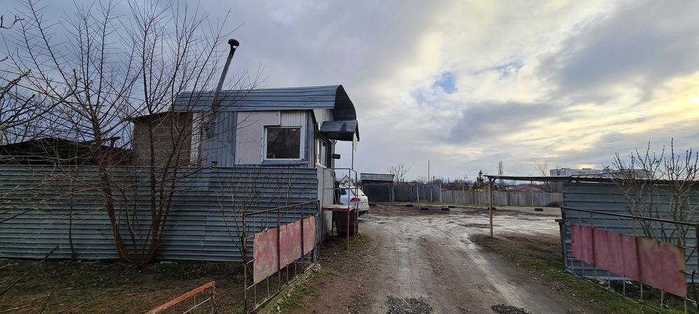 Продаж автостоянки/території. 0.25 га. Октябрьске.