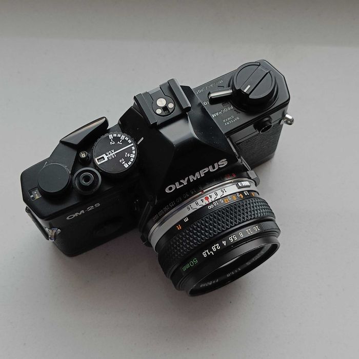 Olympus OM2 Spot Program + Zuiko 50 1.8 + lampa błyskowa Olympus T32