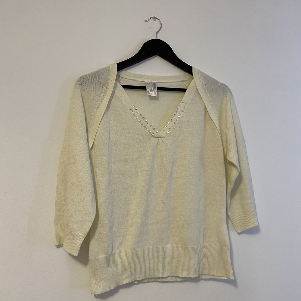 Kremowy sweterek 40 L