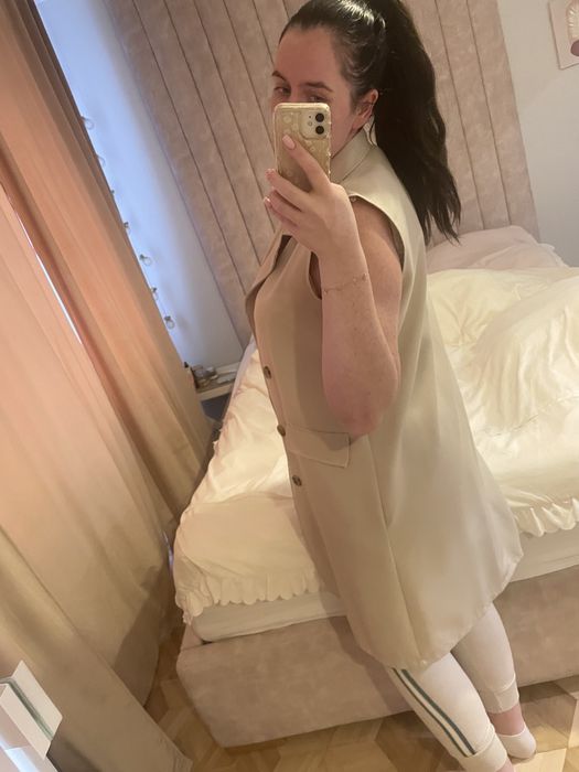 Długa beżowa włoska damska kamizleka, elegancka