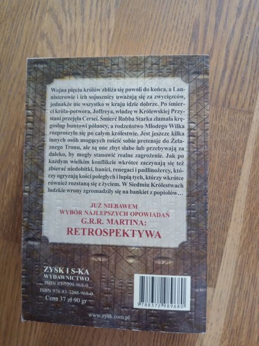 Uczta dla wron. Sieć spisków, G. R. R. Martin