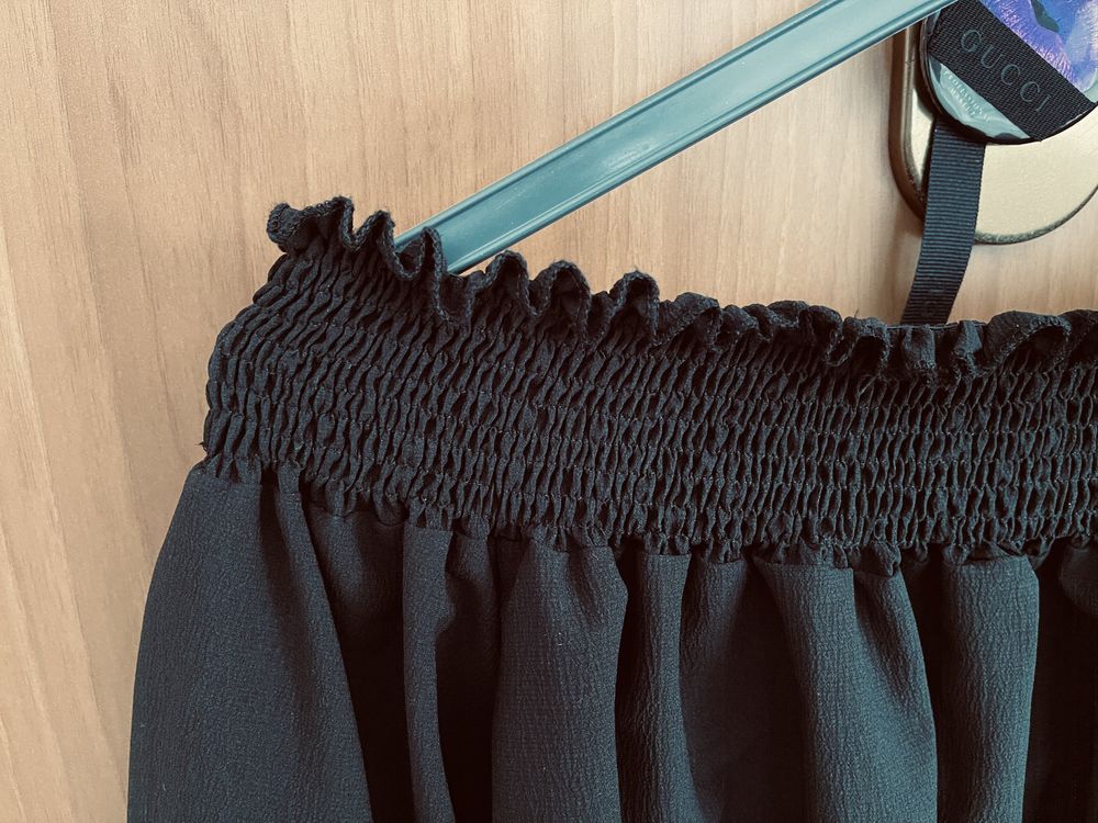 Blusa Preta com tenda