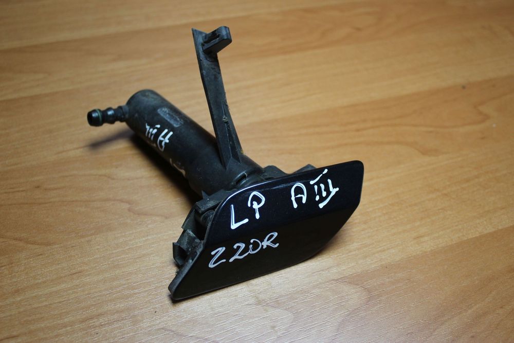 SPRYSKIWACZ LAMPY LEWY PRZÓD OPEL ASTRA H Z20R