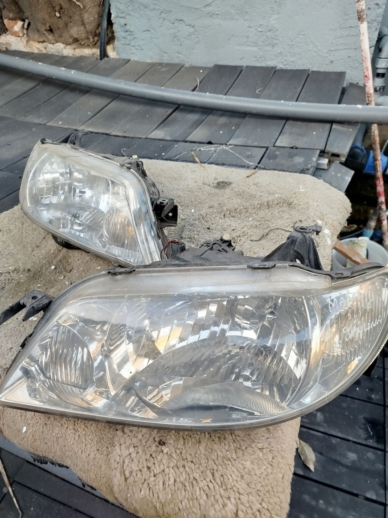 Farol Mazda 323f