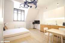 Przestrzenna kawalerka w centrum|Apartamentowiec|Pod inwestycje