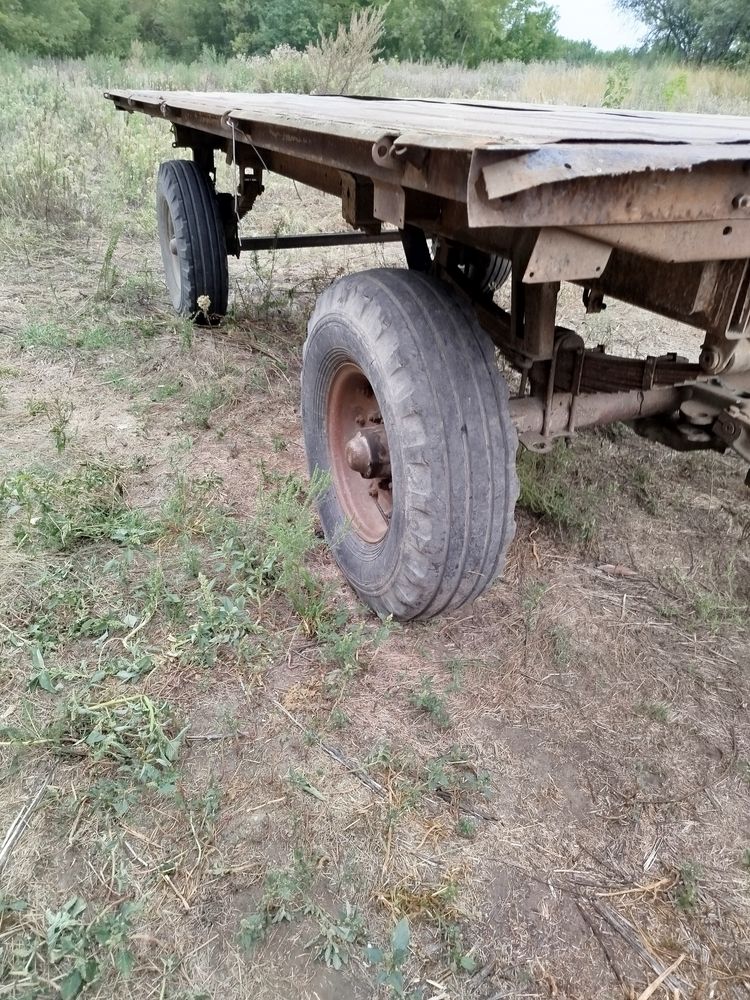 Тракторный прицеп 2ПТС4 на тягах