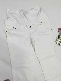 Białe elastyczne spodnie jeansowe dżinsy z szeroką nogawką ciążowe