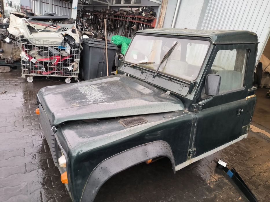 Kabina Land Rover Defender 110 Pickup maska błotnik grill drzwi