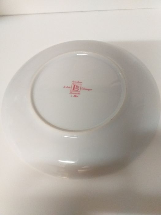 NOVObonito,prato porcelana Limoges de coleção,diam 21,em mãoveja zonas