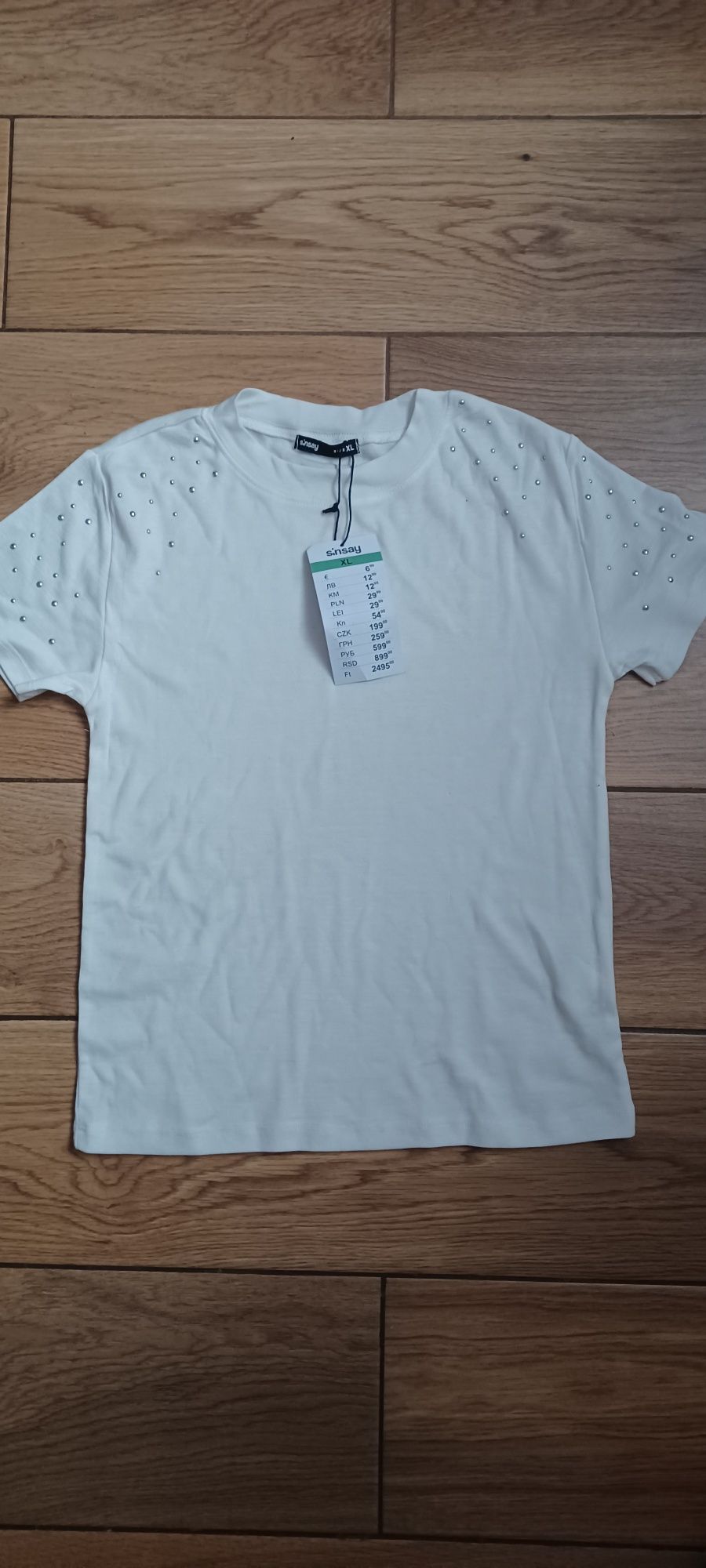 Nowa koszulka bluzka ozdoby na ramionach r.XL