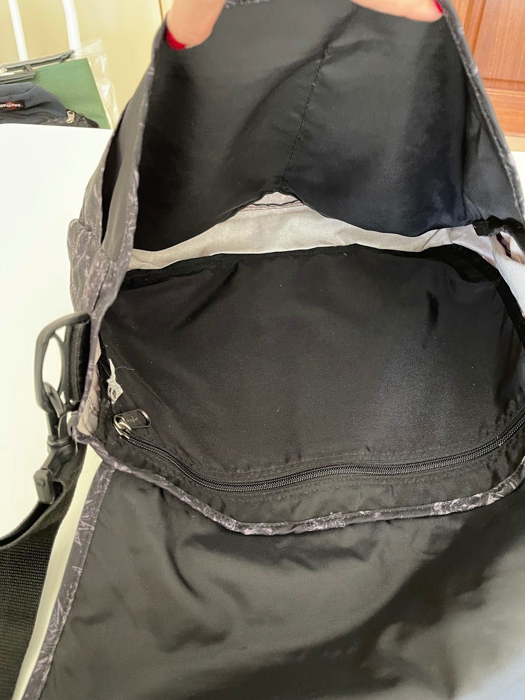 Mala a tiracolo com padrão Eastpak