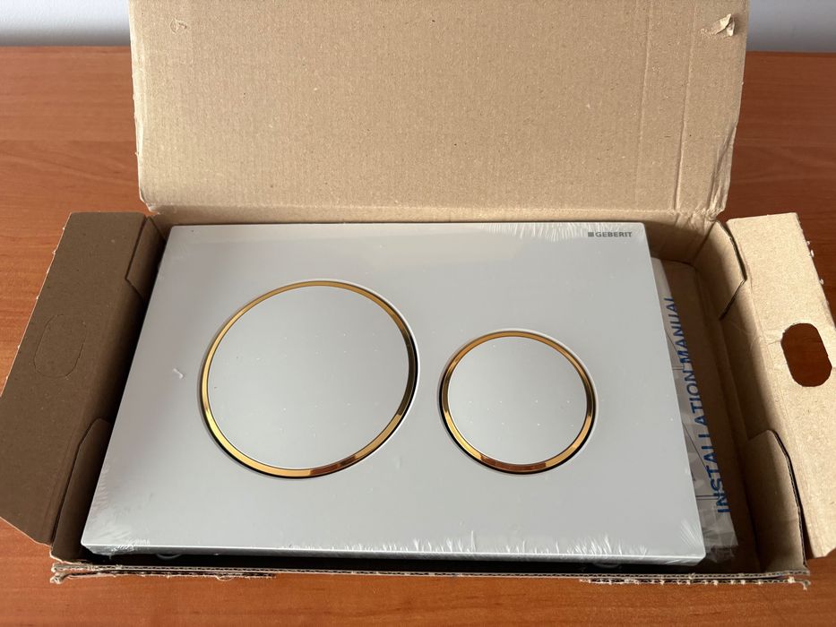 Przycisk spłukujący do WC Geberit Sigma20 biały/złoty