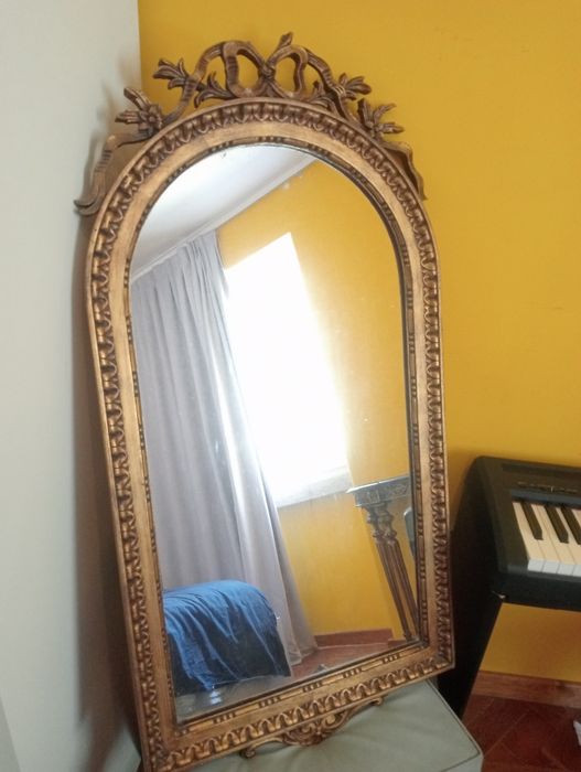 Espelho com ornamento