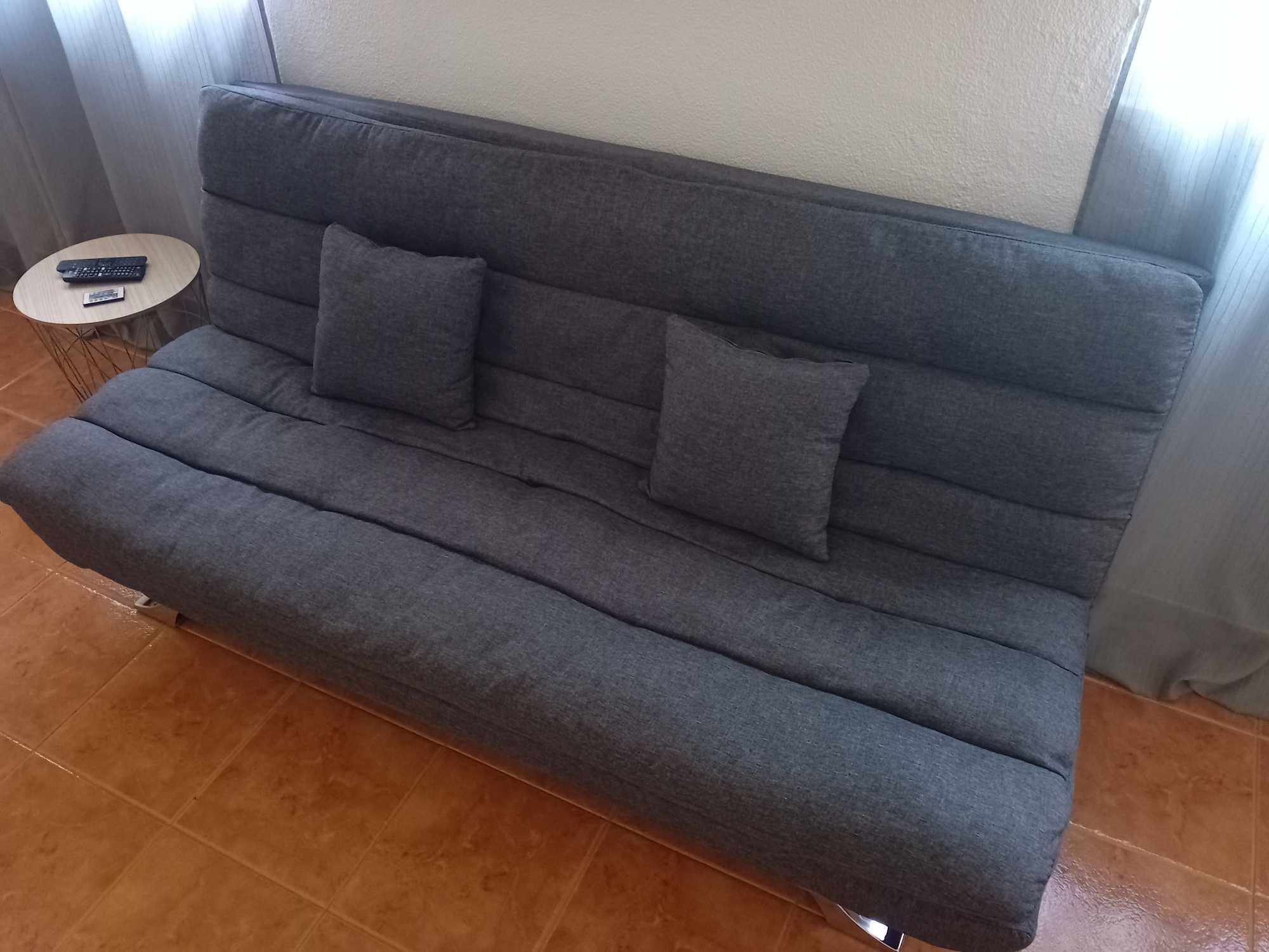 Vendo sofá cama cinza como novo