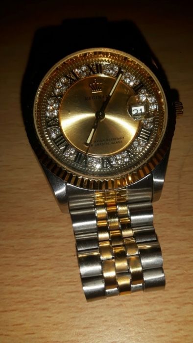 Złoty zegarek z bronsoleta