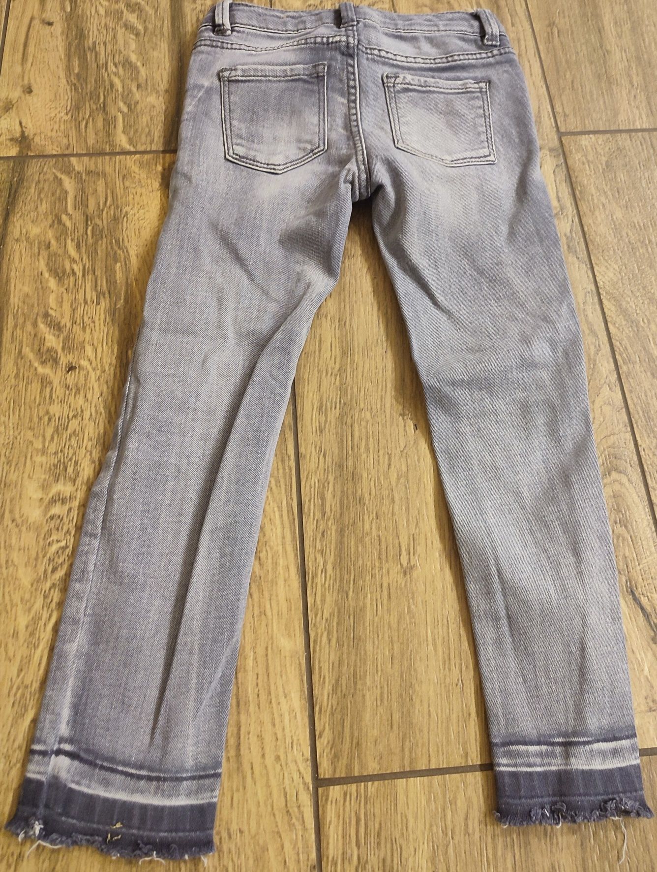 Spodnie jeansowe przetarcia Zara rozmiar 110