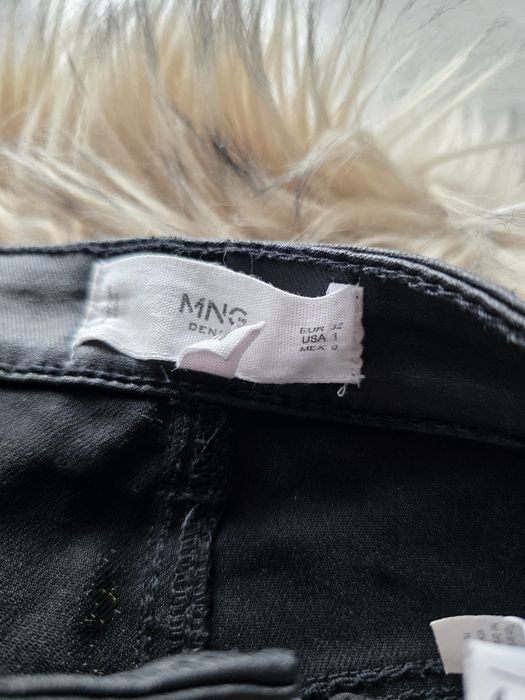 Woskowane spodnie Mango rozm. 32 push-up