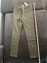 Zielone jeansy z lycrą 34