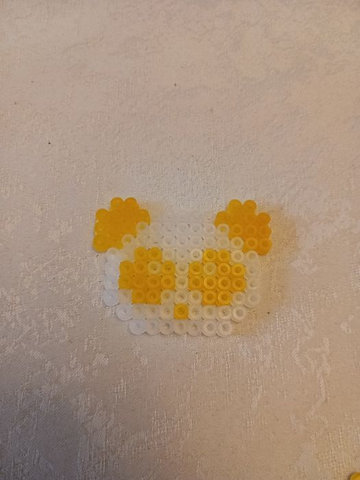 Element rękodzielniczy żółta panda z prasowanych koralików hama
