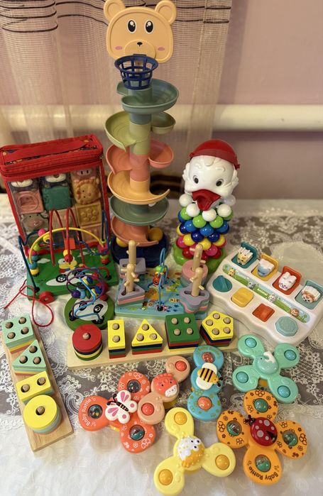 Дитячі іграшки, сортери, головоломки, спінери, піраміда, кубики, яйця