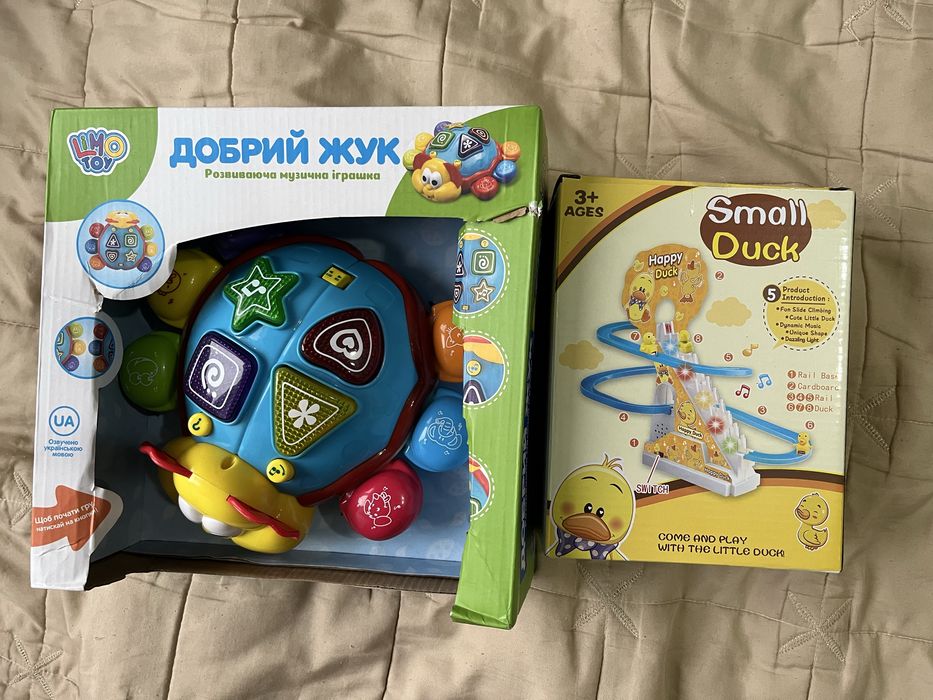 Дитячі іграшки, пляшечки, грілка, бандаж, накладки на соски