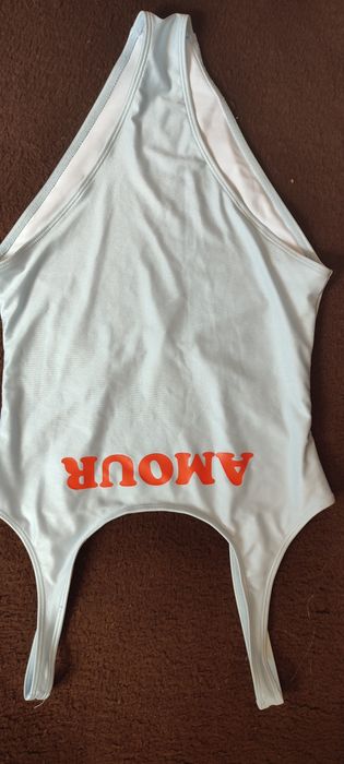 Дешево! Фірмовий купальник. Суцільний купальник.  Стан нового.  С-М