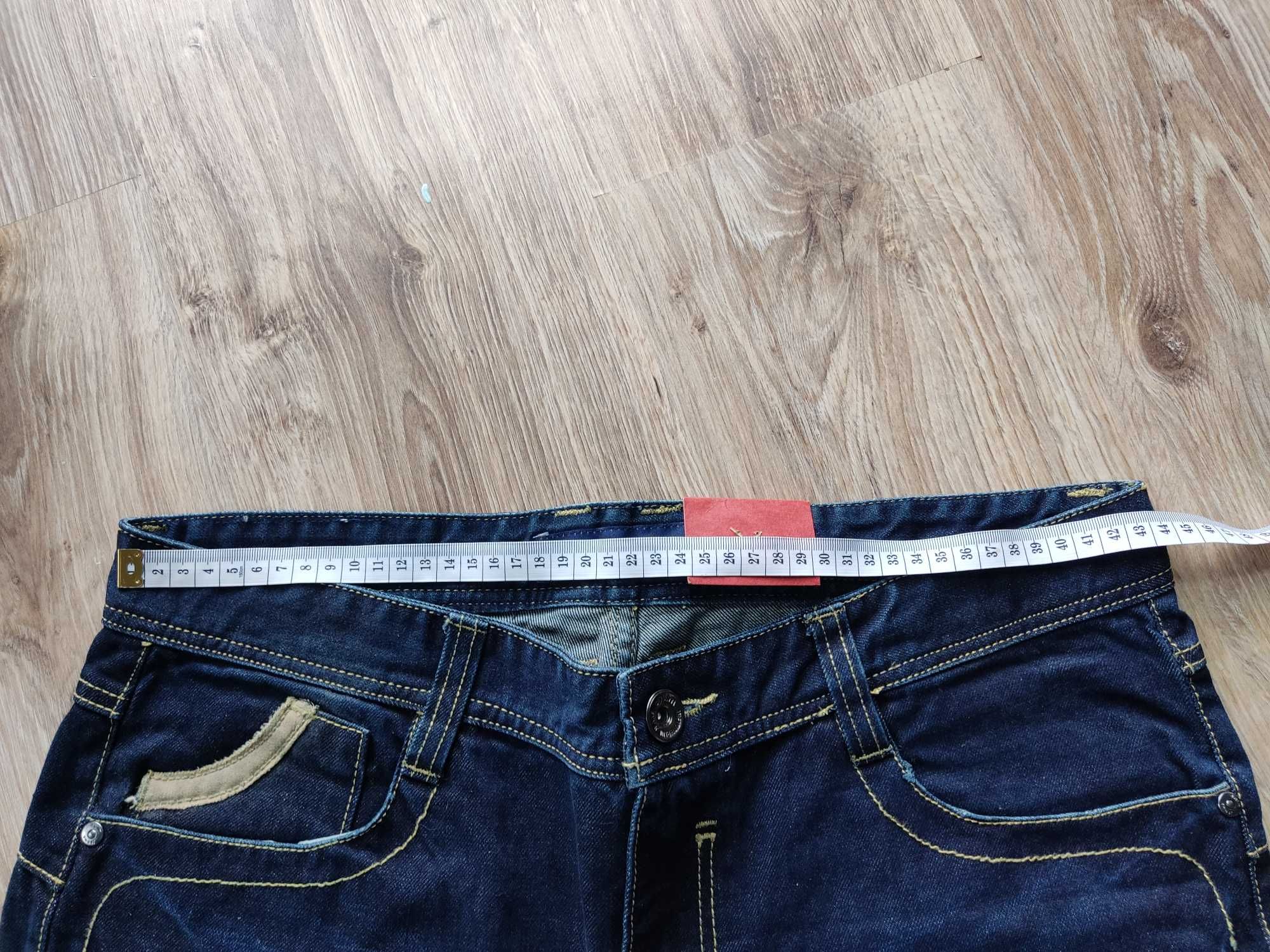 Spodnie jeansowe męskie nowe z przetarciami 2xl