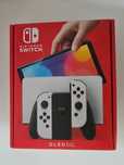 Nintendo Switch OLED + 19 gier + karta pamięci + etui