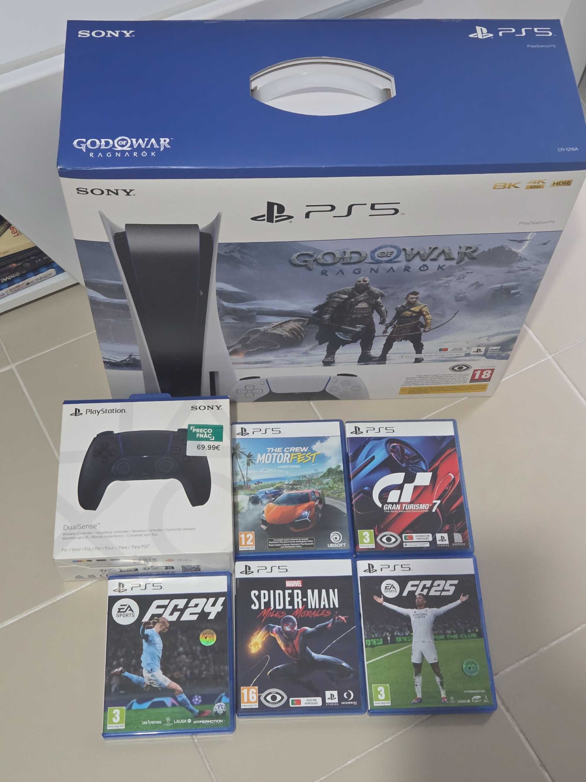 Playstation 5 com 5 jogos + 2 comandos seg.garantia dezembro 2028
