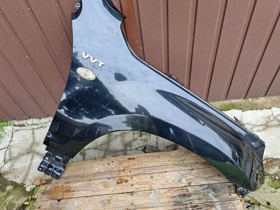 Suzuki Grand Vitara 05-09 blotnik prawy przedni orginał