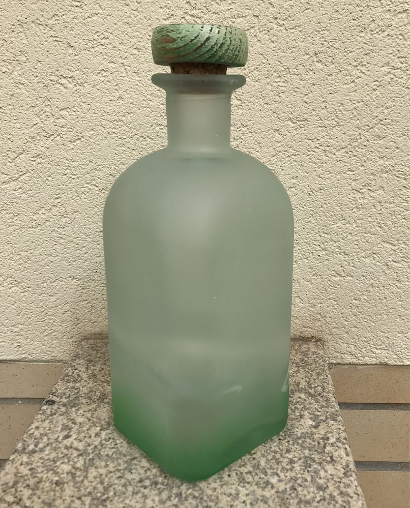 Garrafa antiga de vidro verde
