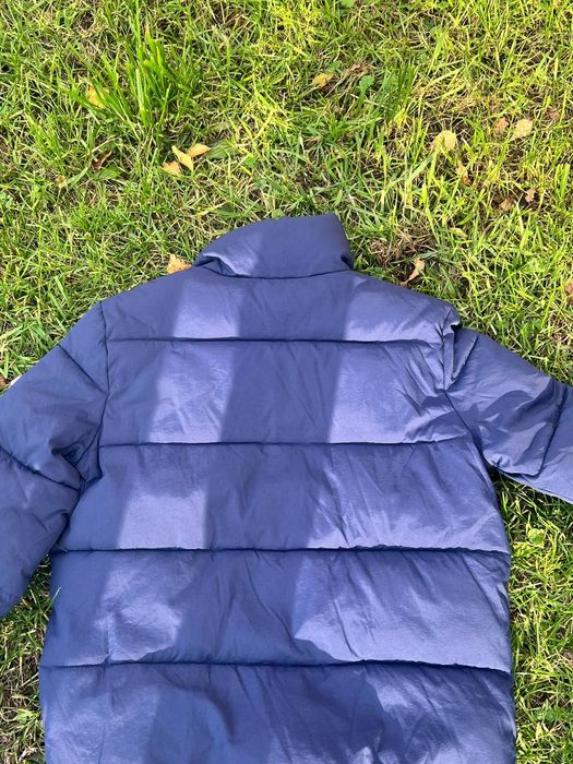 Куртка-пуховик темно-синього кольру на блискавці дві кишені на блискав