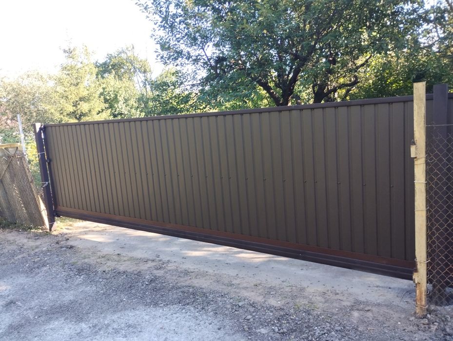 Паркани з профнастилу під ключ ворота відкатні ворота розпашні  забори