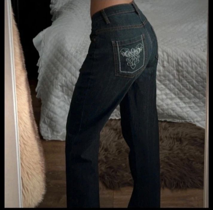 Vintage jeansy ze zdobionymi kieszeniami