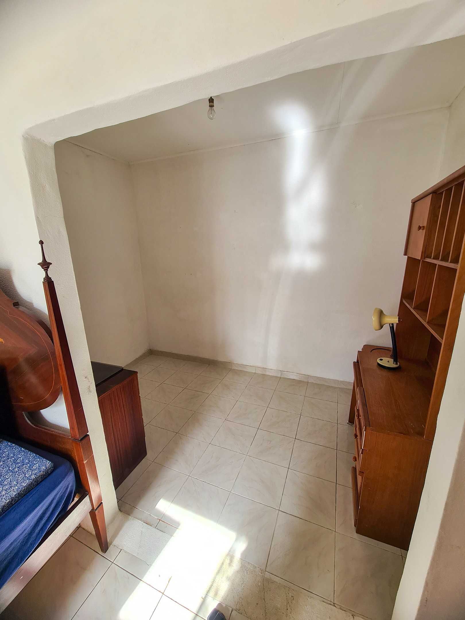 Quarto no centro de Faro