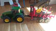 Traktor bruder z przyczepą.