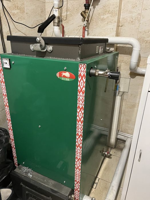 Твердопаливний котел, 18 квт, шахтного типу, з верхньою загруз